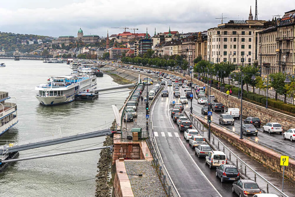 A Rainy Day In Budapest The Photo Shows The Riverfront With Many Cars