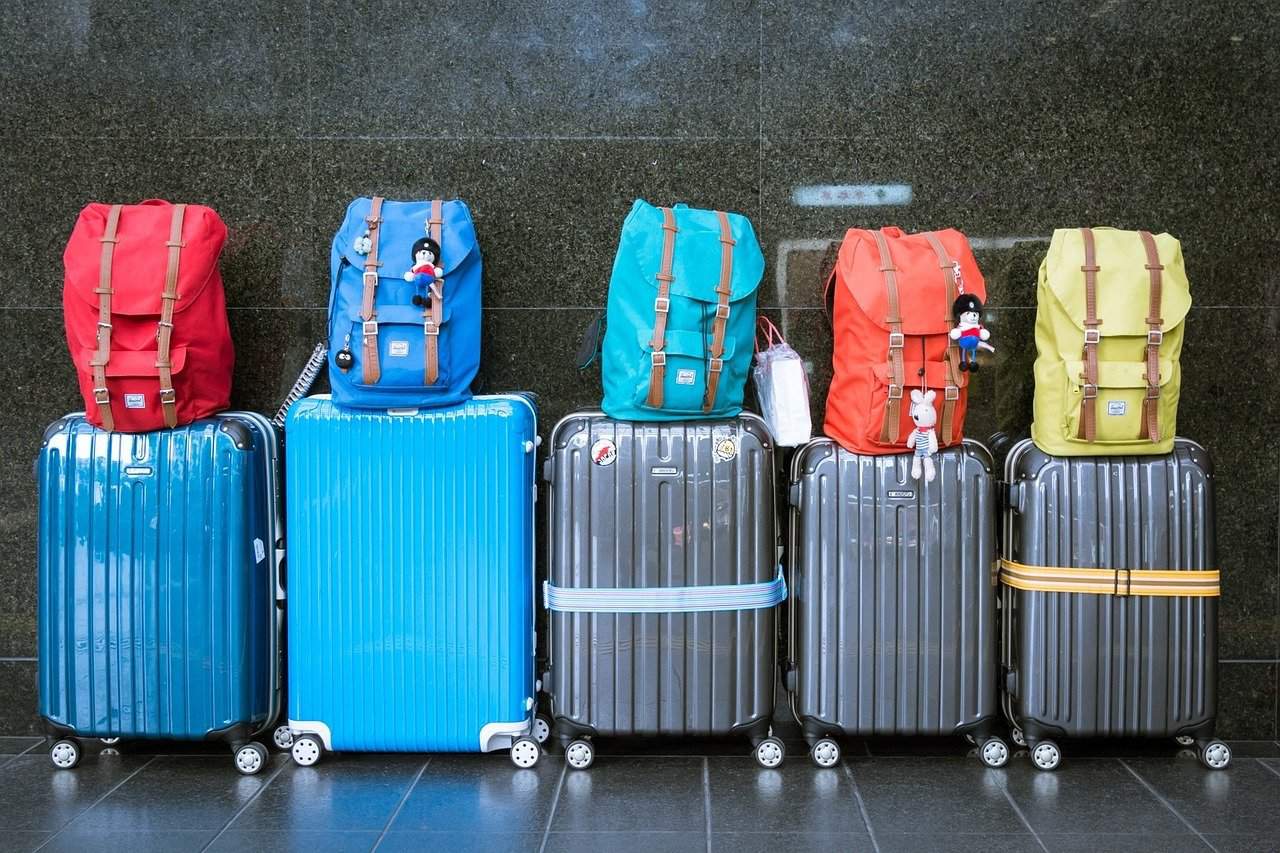 travel-tourism-luggage-moving