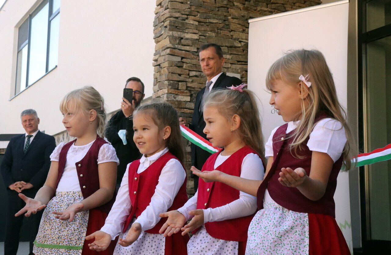 Children perform at the inauguration of the new kindergarten and nursery of the local Reformed parish in Királyhelmec