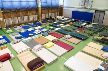 Beds for refugees in a sports hall
