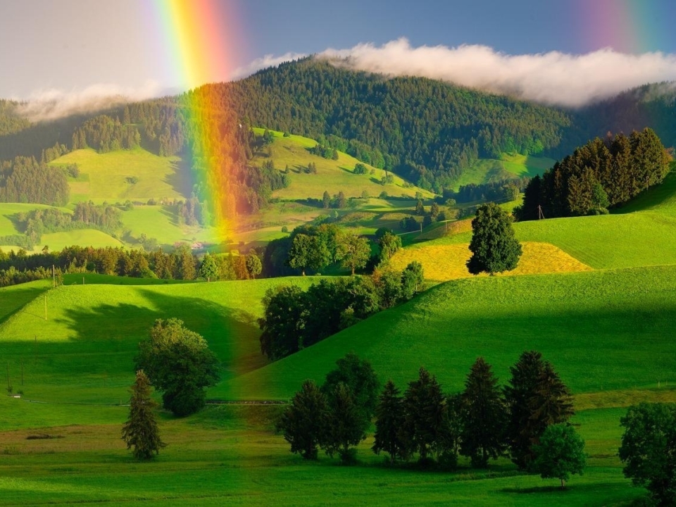 rainbow over hills