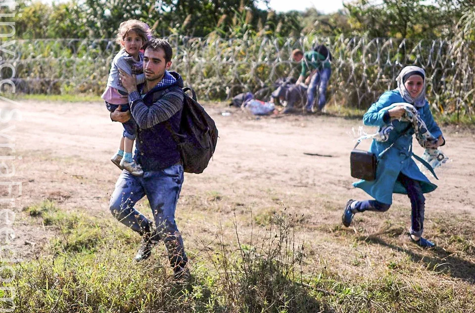 Refugee family Hungarian border