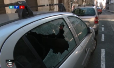 window broken Budapest crime