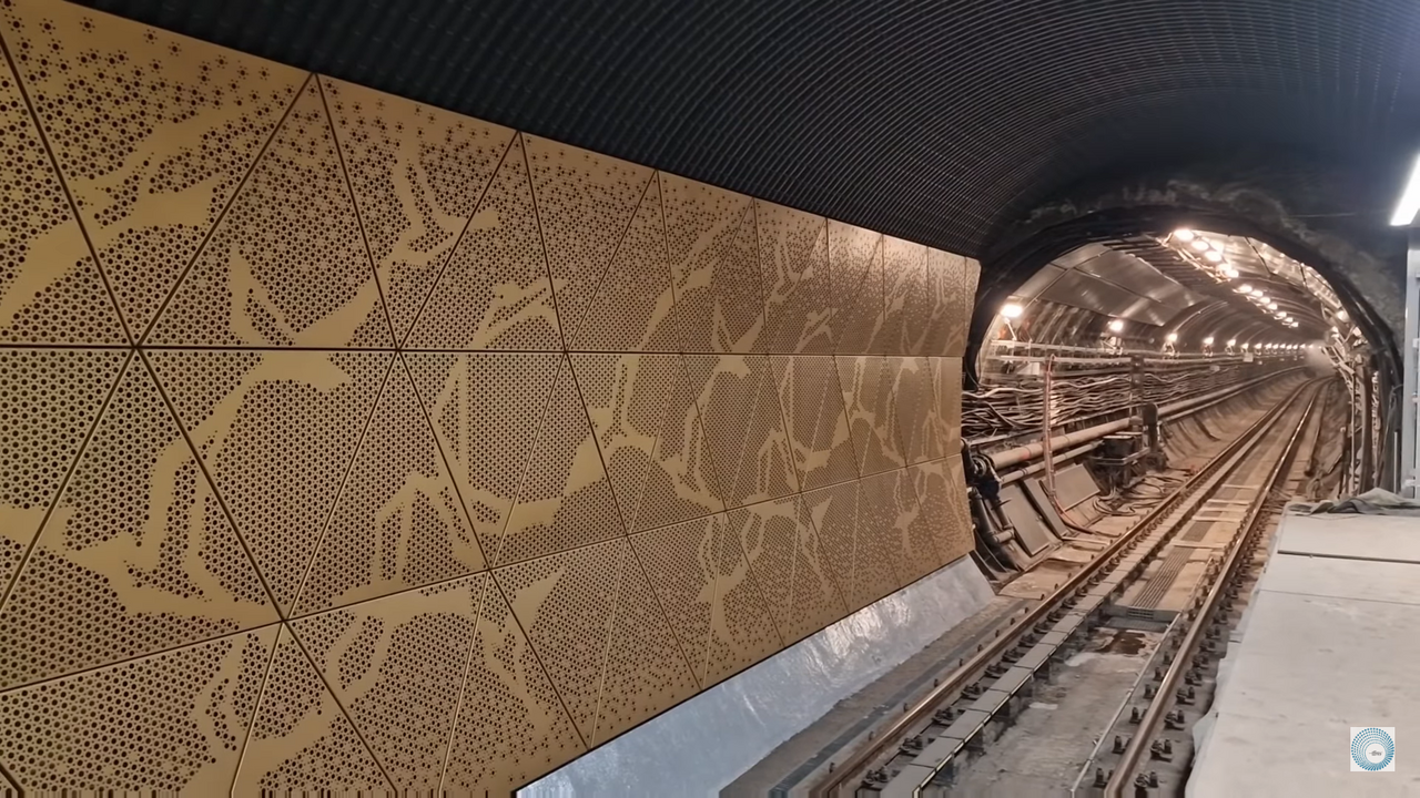 Golden coloured M3 metro station's bird design