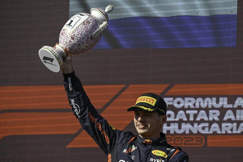Max Verstappen and his trophy